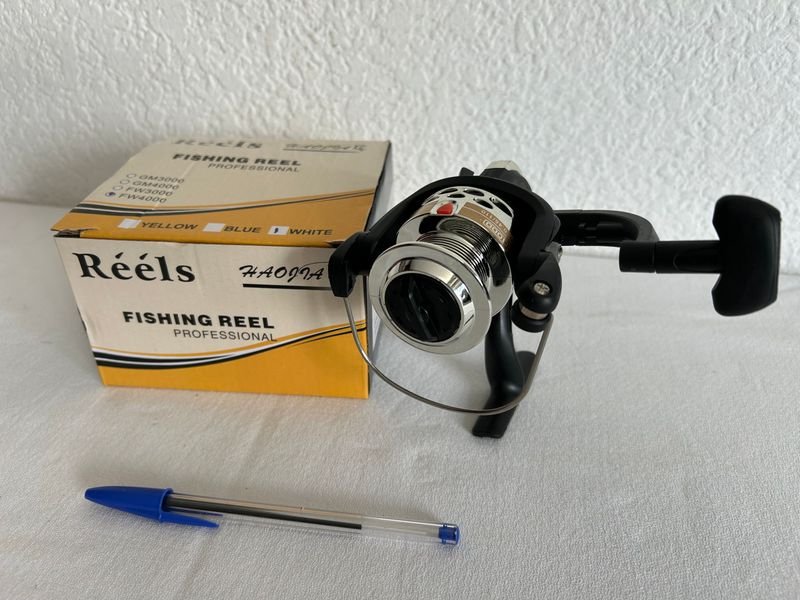 Reel de pesca nuevo en excelente condición - imagen 5