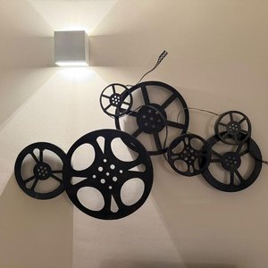 Lote anterior: Adorno de Pared Cinematográfico con Ruedas de Película