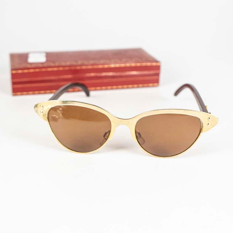 Lentes de sol Cartier en caja con detalles