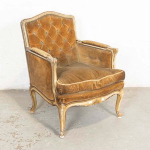 Lote siguiente: Butaca Francesa Estilo Luis XV Dorada con Tapizado Marrón Capitaneado