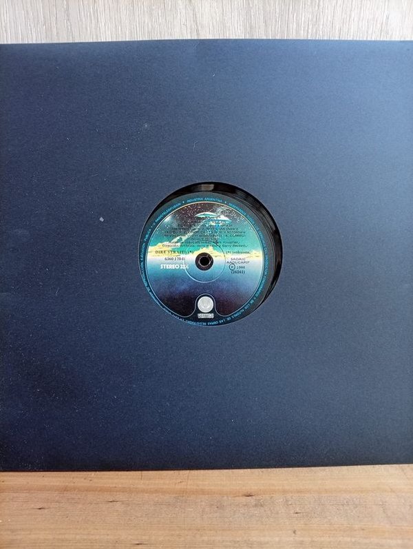 187) Disco LP ( Dire Straits) Comunique  Con Sobre Generico  1986 Industria Argentina
