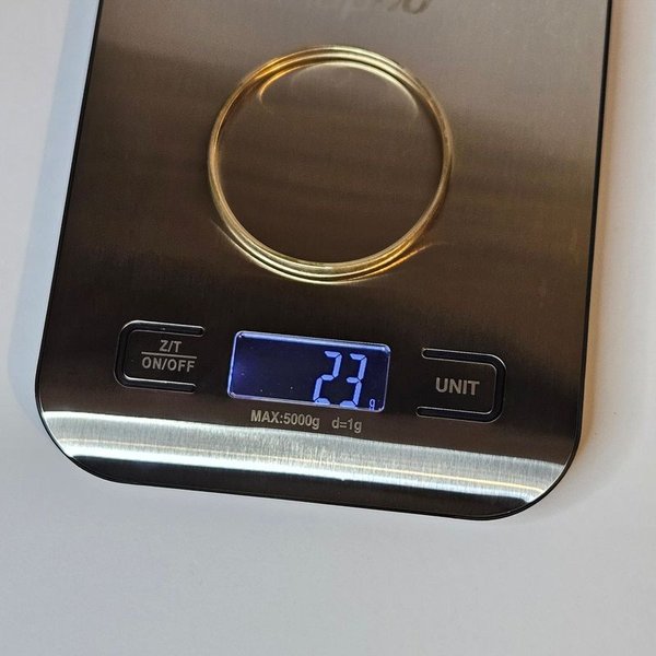 Anillo de oro en escala - imagen 1