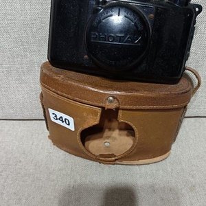 Lote siguiente: Cámara Fotográfica Photax con Estuche de Cuero Marrón
