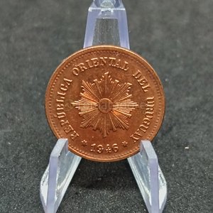 Lote siguiente: Moneda de 5 Centésimos de Uruguay - Año 1946