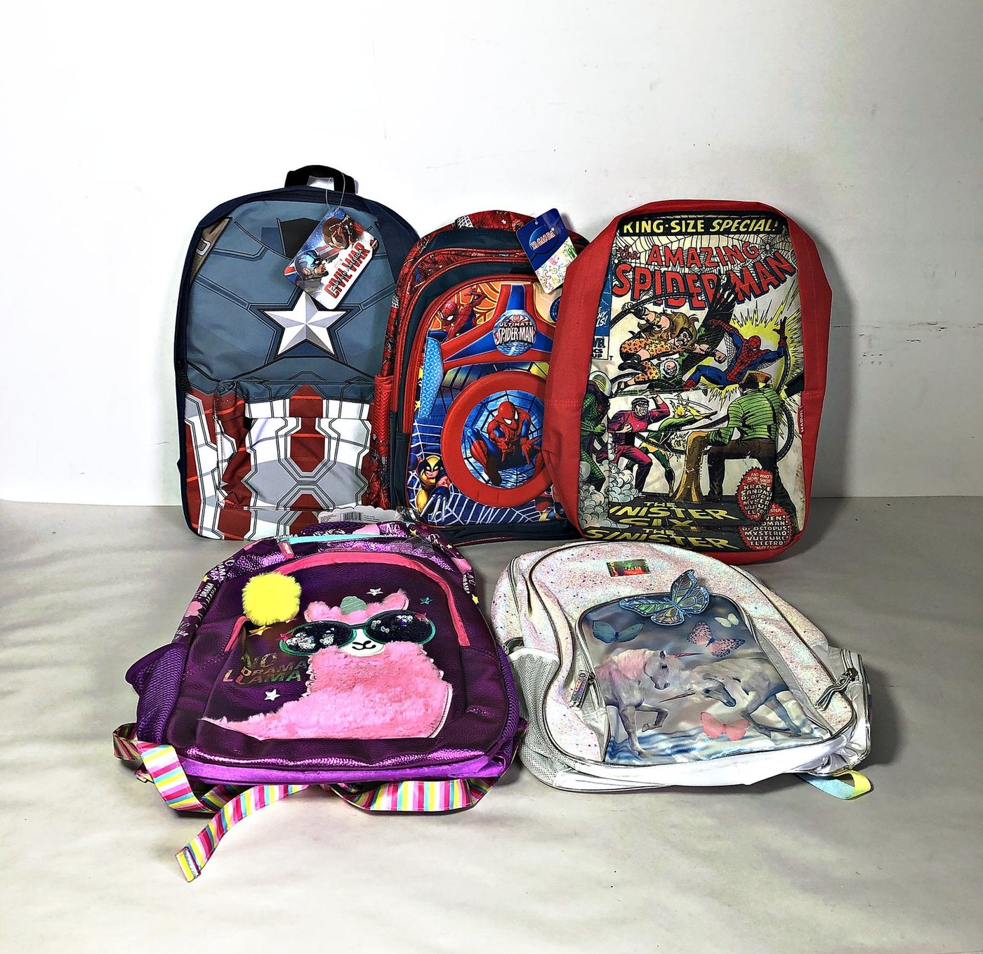 Lote de 5 Mochilas Infantiles con Personajes y Diseños Brillantes