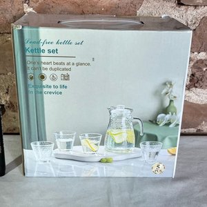 Lote siguiente: Jarra y 4 Vasos de Vidrio Transparente