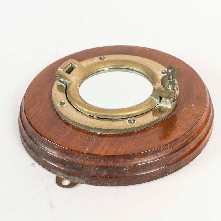 Ojo de Buey con Espejo de Bronce y Base de Madera