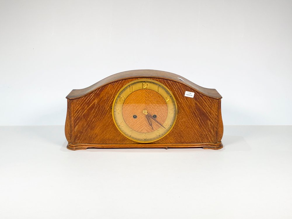 Lote siguiente: Reloj alemán Art Deco con péndulo y llave