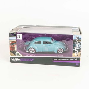 Lote siguiente: Auto Volkswagen Beetle escala 1/24 colección Maisto en su caja original