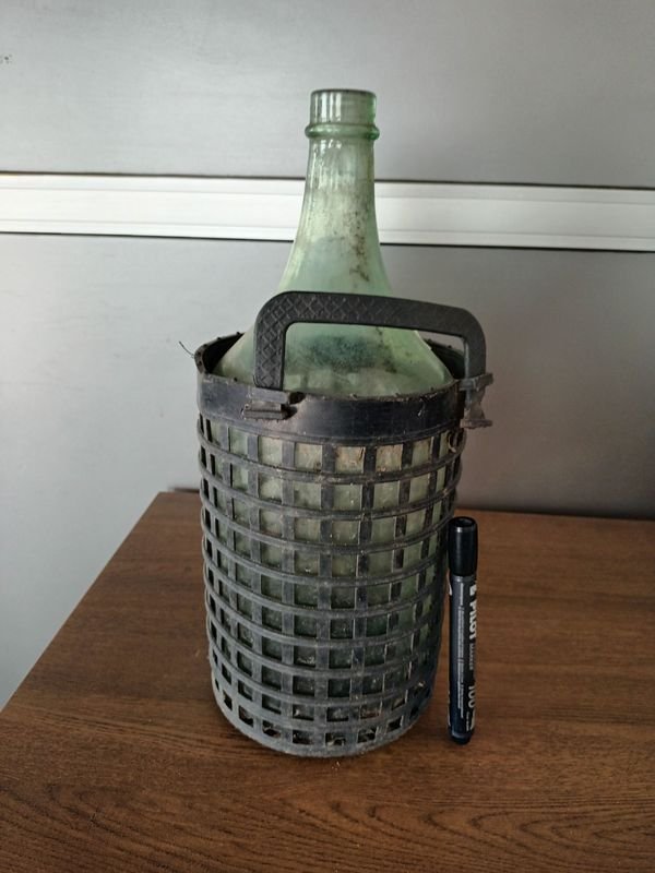 Lote anterior: Botella de vidrio con cubeta y velas