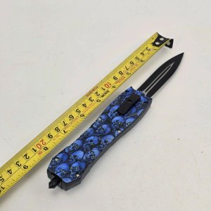 Navaja Automática con Diseño de Calaveras Azules - imagen 2