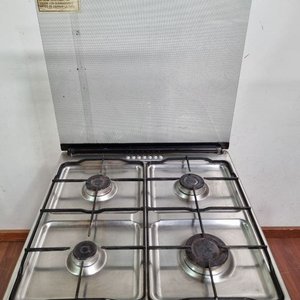 Cocina a Gas y Eléctrica Acero Inoxidable con Horno y 4 Hornallas - imagen 4