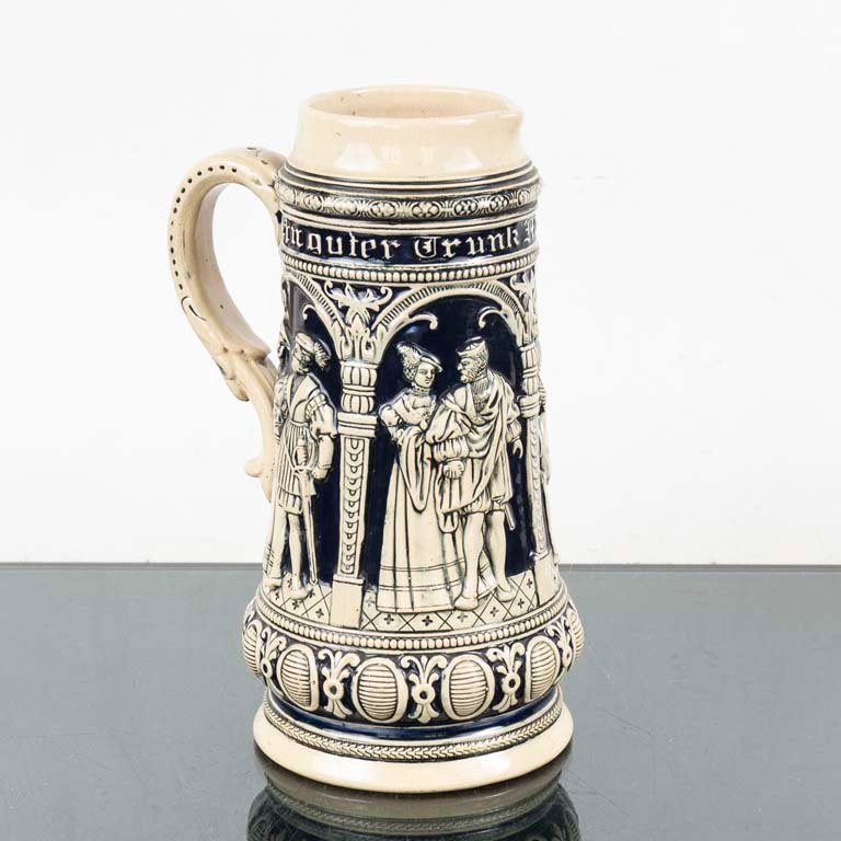 Lote anterior: Jarra de cerveza alemana con figuras en relieve