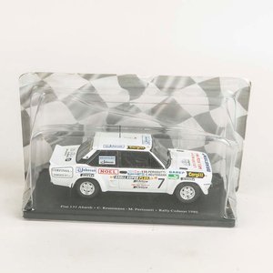 Lote siguiente: Auto Fiat 131 Abarth C. Reuteman - M. Perissutti Rally Codasur 1980 escala 1/24 en su estuche original 