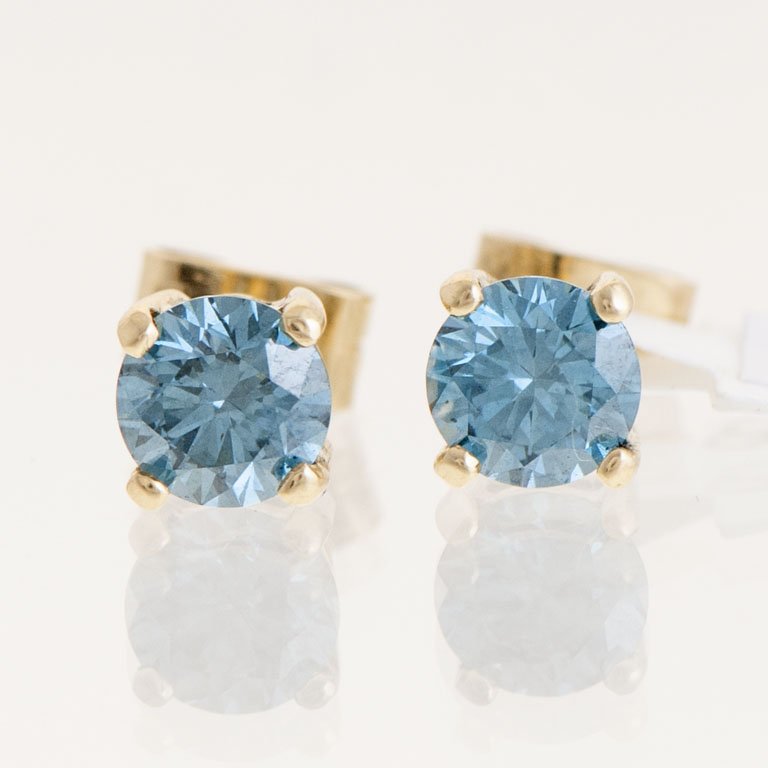 Lote anterior: Par de tornillos oro 18k con brillantes azules