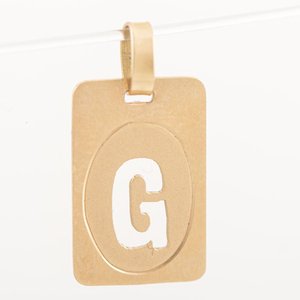 Lote siguiente: Dije de Oro 18k con Letra G