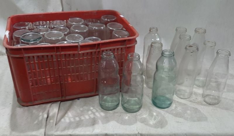 Lote siguiente: Bolsas de vidrio y latas vacías