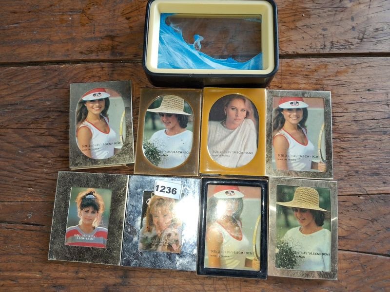 Lote anterior: Colección de mini portaretratos y adorno