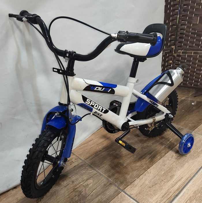 Bicicleta infantil blanca y azul con accesorios - imagen 3
