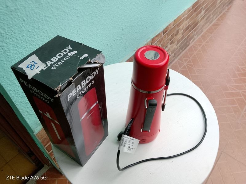 Lote siguiente: Termo con calentador y cable