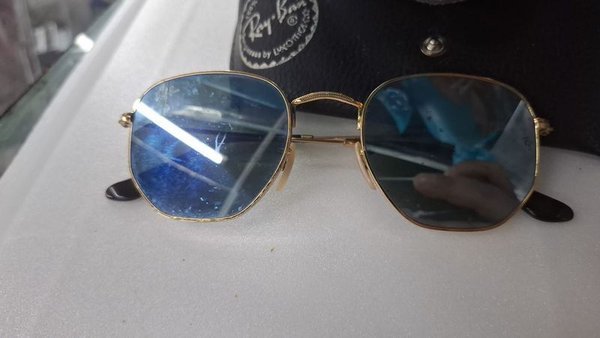 Anteojos de Sol Ray-Ban Hexagonal Dorados con Estuche - imagen 1
