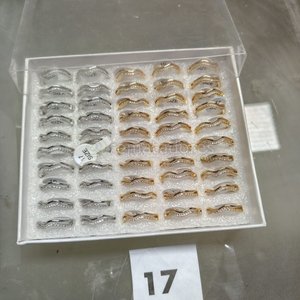 Lote de Anillos Plateados y Dorados con Circones - imagen 1