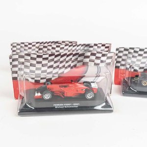 4 autos F1: Ferrari F2001 de Michael Schumacher (2), Lotus 72D - 1972 de Emerson Fitipaldi y Brabham BT 49 - 1991 de Nelson Piquet en estuche original. - imagen 2