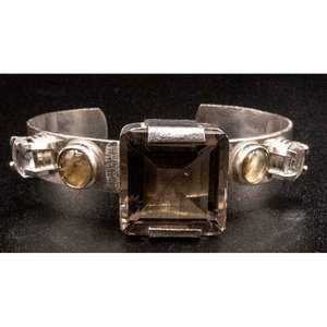 Lote siguiente: Pulsera Esclava Plata 950 con Cuarzo Ahumado y Crisol