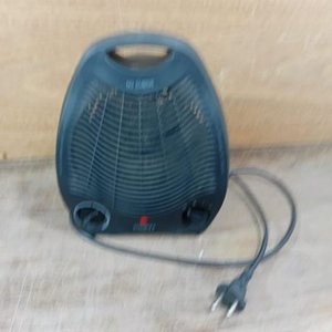 Caloventilador Xion Negro Funcionando - imagen 2