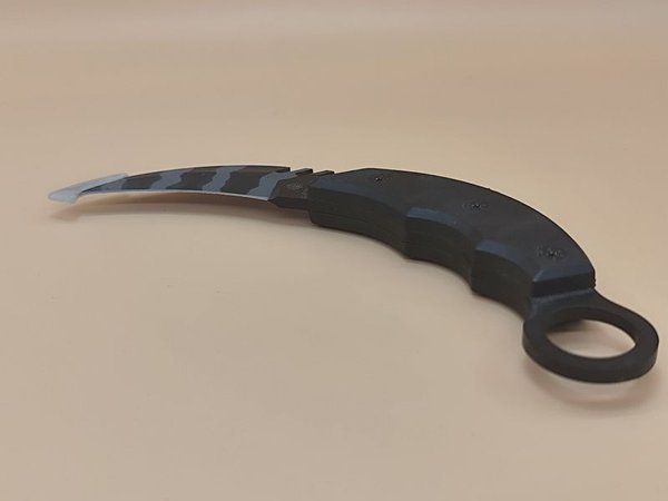 Cuchillo Karambit con diseño único - imagen 4