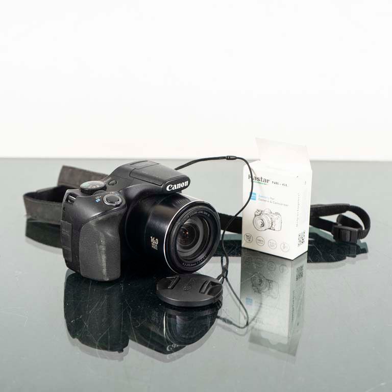 Cámara digital Canon y batería en venta