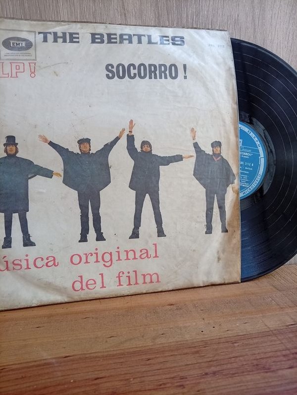 192) Disco LP ( The Beatles) Socorro) Industria Uruguaya  Si datacion de año