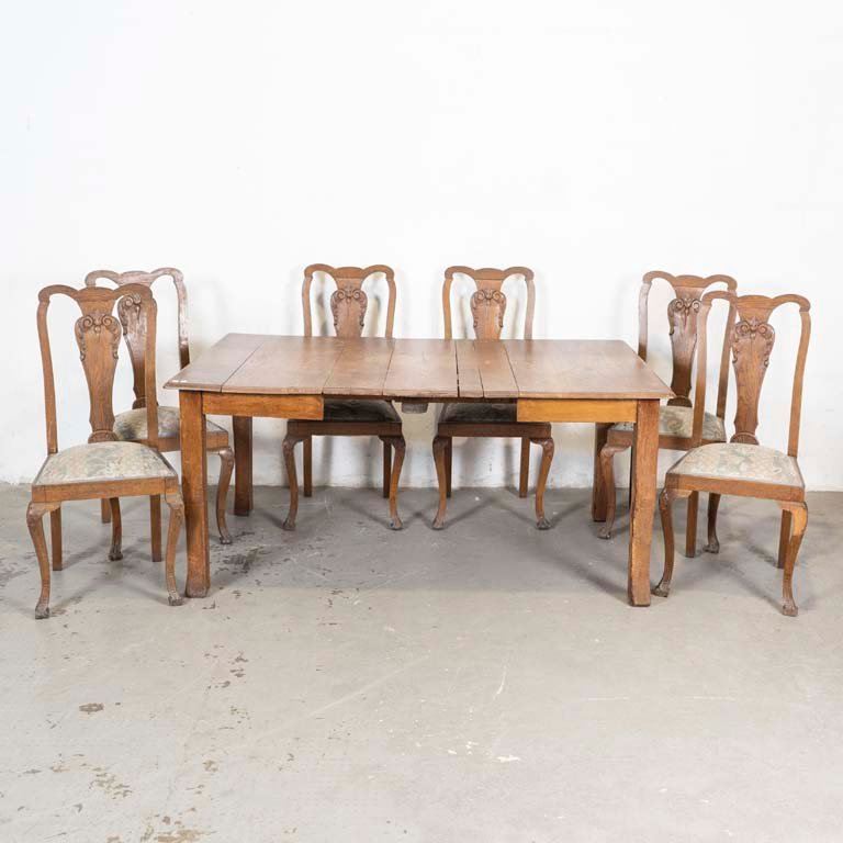 Lote siguiente: Mesa de comedor y sillas estilo Chippendale