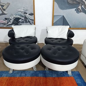 Lote anterior: Conjunto Sillón Giratorio y Puff Bicolor de Cuero Diseño Mario Spinelli