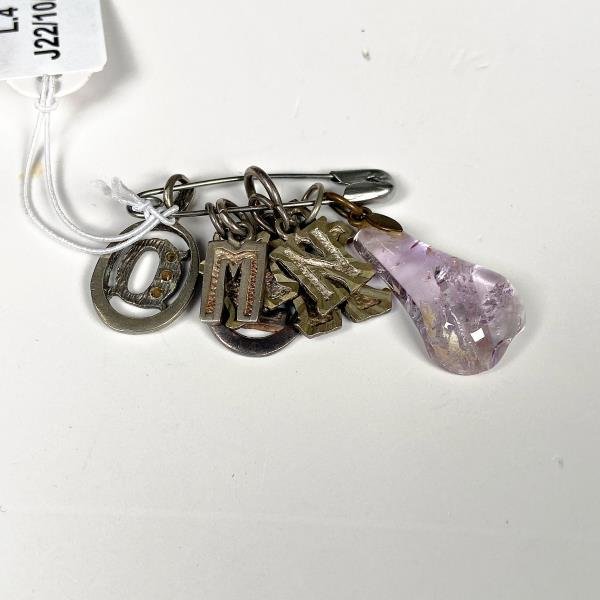 Lote de Siete Dijes de Plata con Piedra Morada - imagen 1