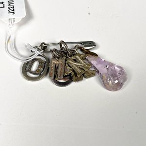 Lote anterior: Lote de Siete Dijes de Plata con Piedra Morada