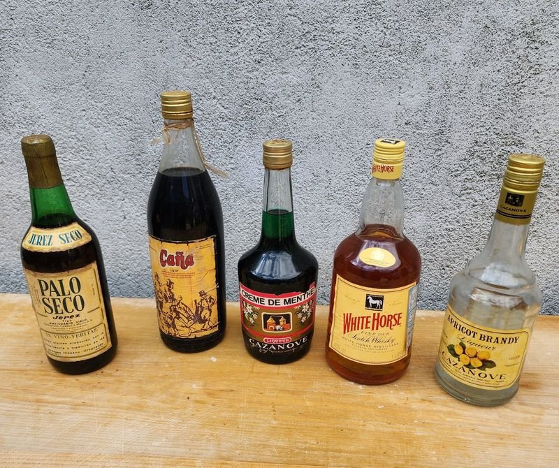 Lote de Botellas de Bebidas: Brandy, Caña Oyama y Más