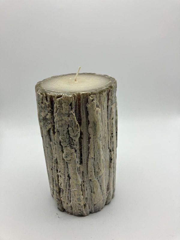 Vela decorativa con forma de tronco de árbol