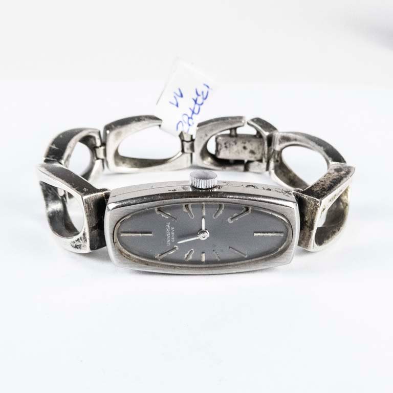 Lote anterior: Reloj de plata con caja de acero no funcional