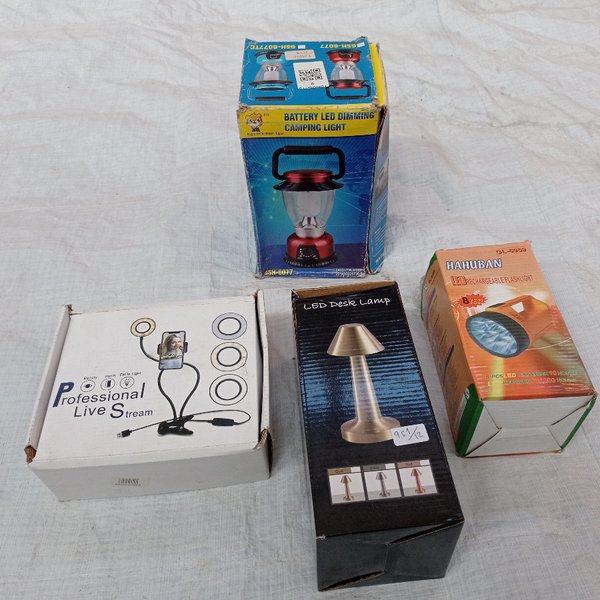 Cuatro piezas. linterna + farol de camping + lampara + soporte para celular. - imagen 1