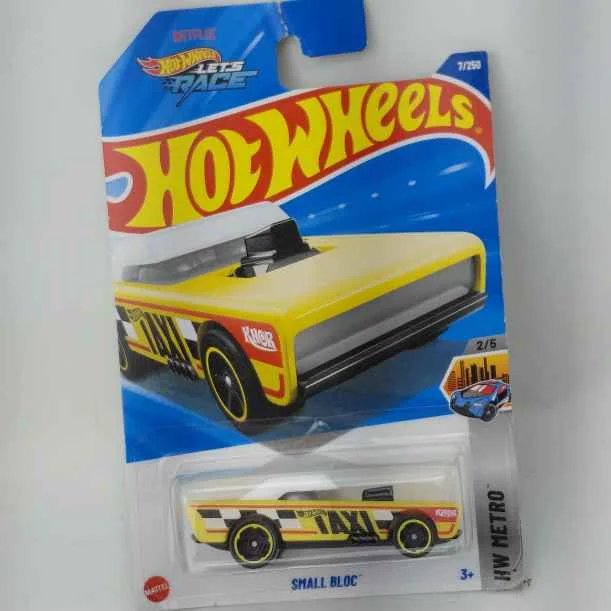 Coche de juguete Hot Wheels con diseño de taxi