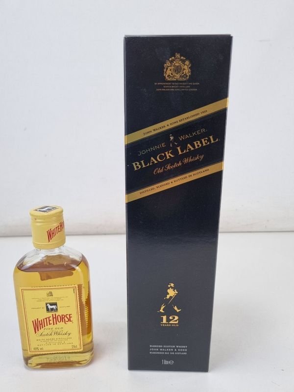 Lote siguiente: Whisky White Horse y Johnnie Walker Black Label