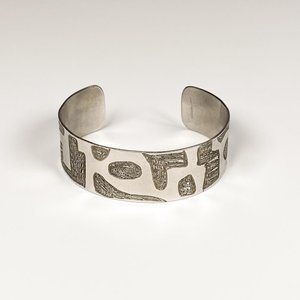 Lote anterior: Brazalete de Acero Decorado con Firma