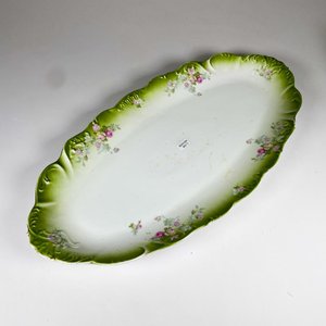 Lote siguiente: Fuente grande oval porcelana isabelina, decorada floral 60 x 30 cm