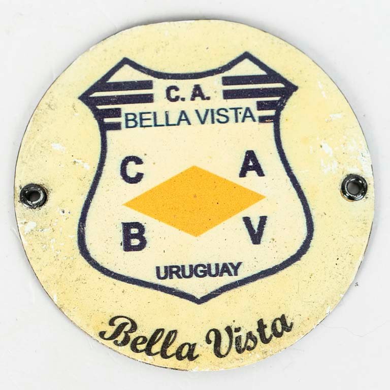 Lote siguiente: Escudo de Bella Vista de chapa litografiada - Medidas: diámetro 11cm