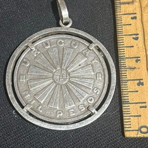Lote siguiente: Moneda de Plata 900 FAO Uruguay 1969 Engarzada