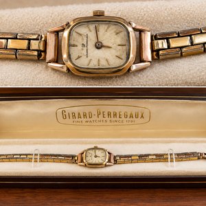 Lote siguiente: Reloj Girard-Perregaux Vintage Dama Caja Rectangular Oro y Acero