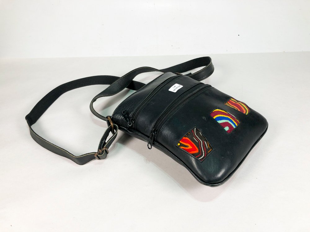 Lote anterior: Cartera de cuero con diseño colorido