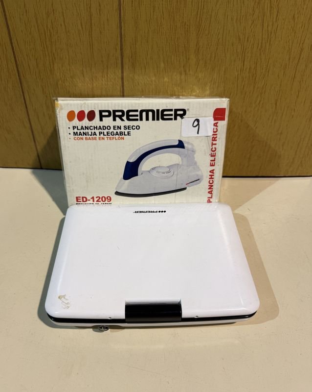 Plancha de Viaje Premier y Reproductor DVD Portátil