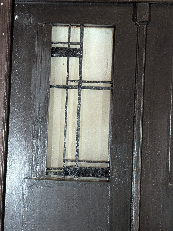 Puerta de frente antigua en cedro con reja y marco de pinotea - imagen 4